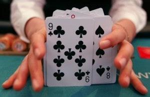 A card dealer adjusts cards at the Paradise Walker-hill casino in Seoul