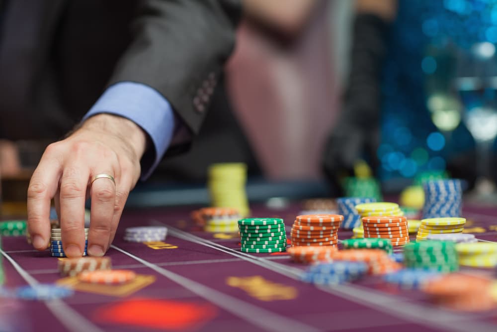 player wagering a stack of chips